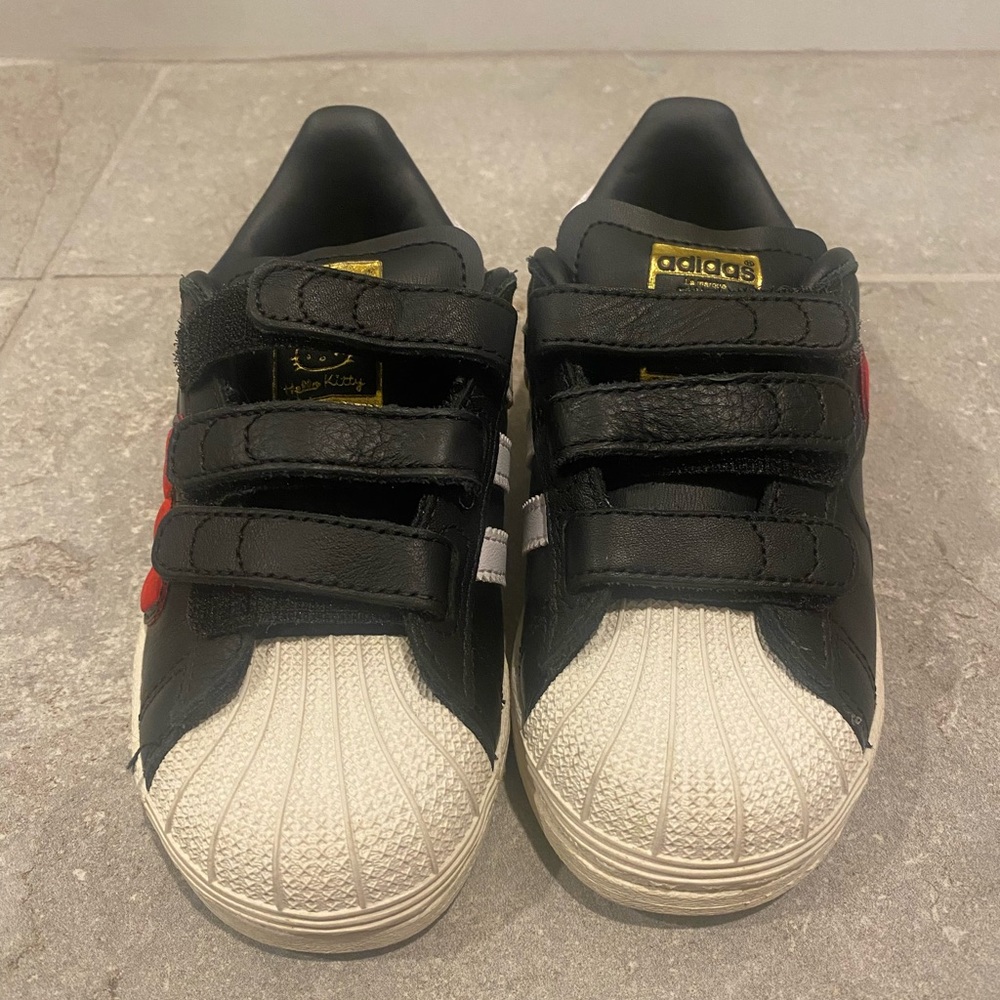 Adidas Black and White Sneakers with Iconic Shell Toe